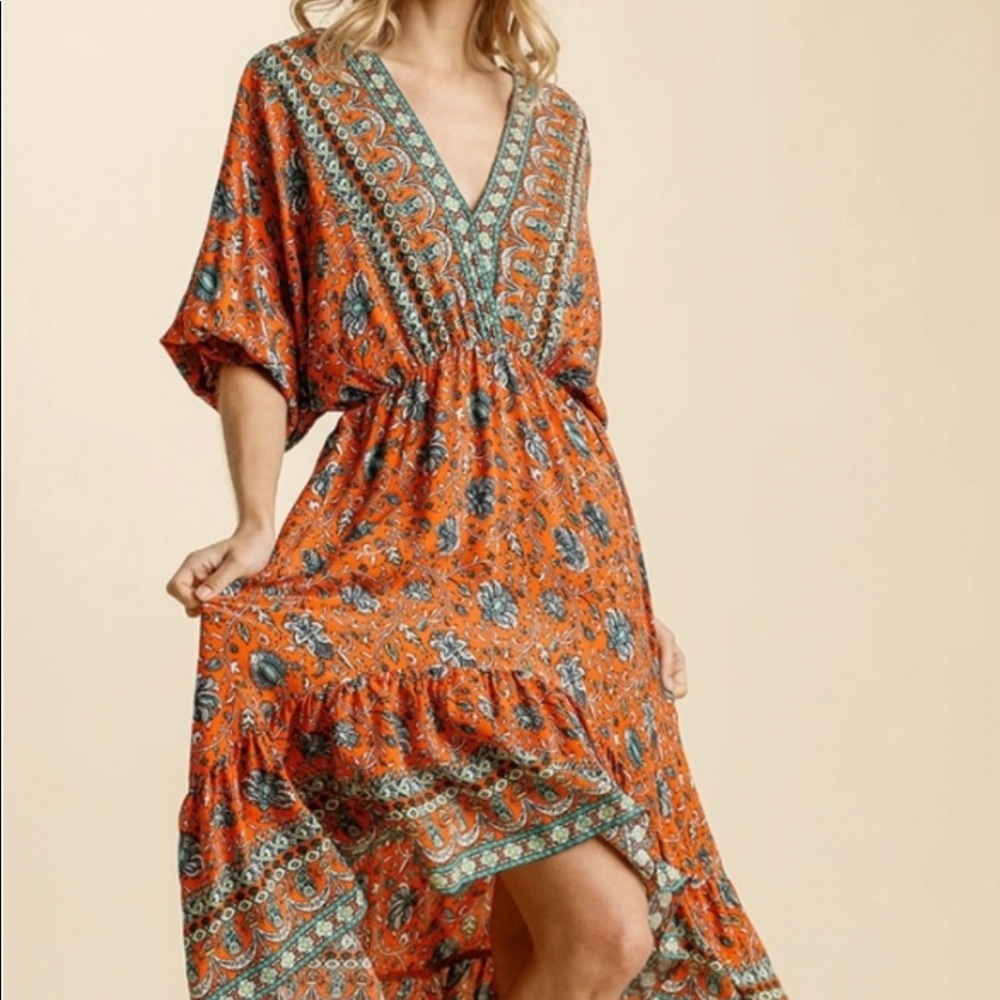 Fall fun ruffle bottom hi-low dress.